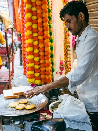 Man making street food in India
