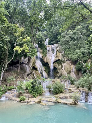 Clear blue water of Kuang Si waterfalls