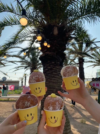 Fried doughnuts in Jeju South Korea on a things to do family trip 