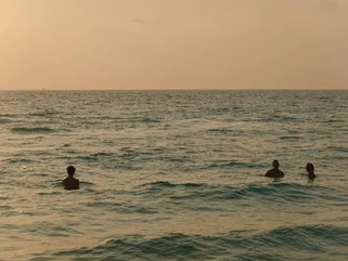 Tourists in a quiet part of the sea in Cambodia Koh Rong in November