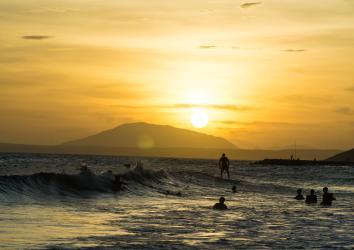 Surfing at sunset in Mui Ne