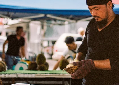 Borneo - Kota Kinabalu durian man at market