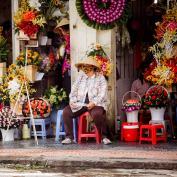 Vietnam woman at market wearing a face mask