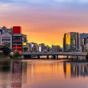 Sunset behind bridge over Naka River in Fukuoka - Vichie81/Pixta