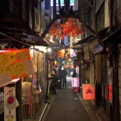 People eating in the street in autumn