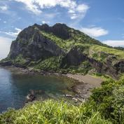 Rocky peninsula and cove on Jeju Island