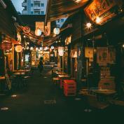 Japanese food stalls and outdoor seating at night
