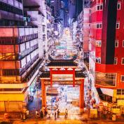 Aerial view of night market in middle of street in Hong Kong