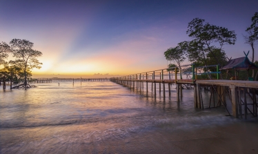 Sunset over jetty at Bintan Island