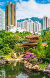 Ornate gardens with skyscrapers in the background