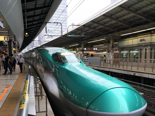 Nose of the shinkansen bullet train at a station in Japan 