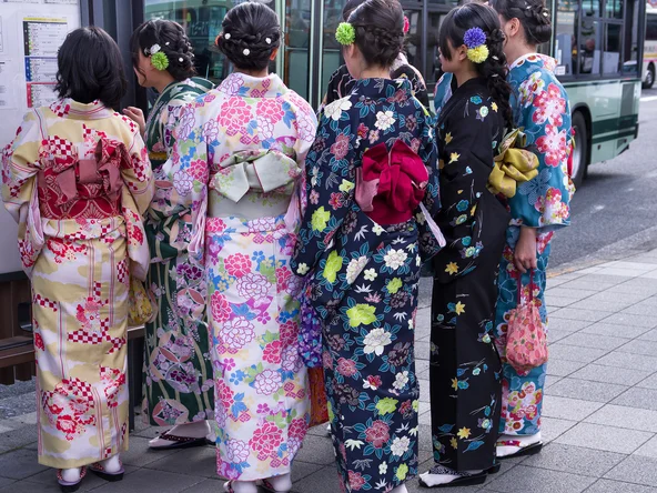 Group of Japanese ladies wearing colourful kimonos 