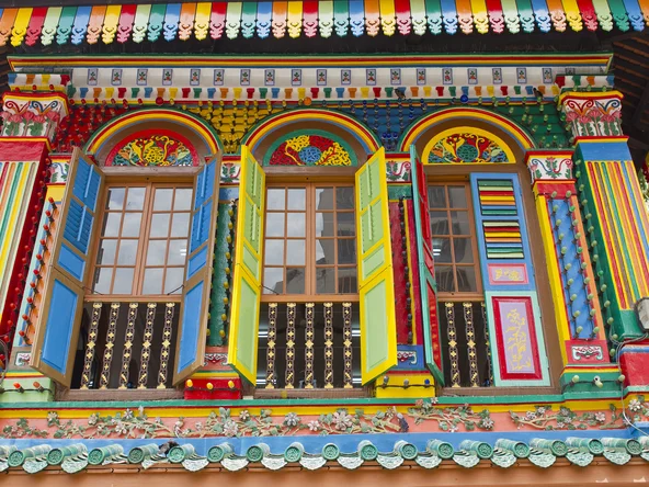 Brightly coloured Peranakan houses in Little India district of Singapore 