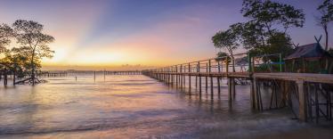 Sunset over jetty at Bintan Island 
