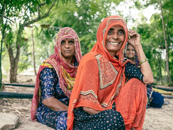 Indian women smiling at the camera