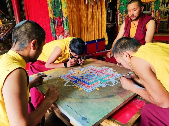 Tibetan monks doing traditional art