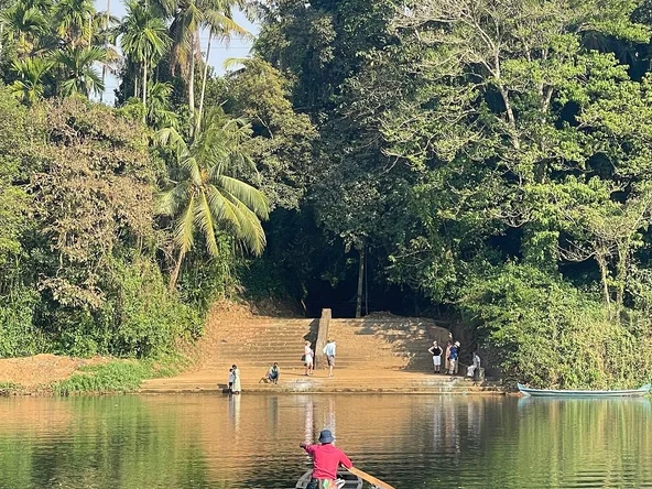 Man on canoe in India