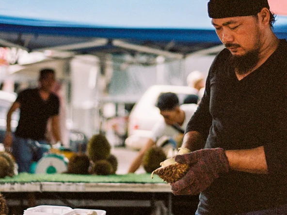Borneo - Kota Kinabalu durian man at market