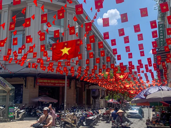 Vietnam flags on a street during Reunification day in March