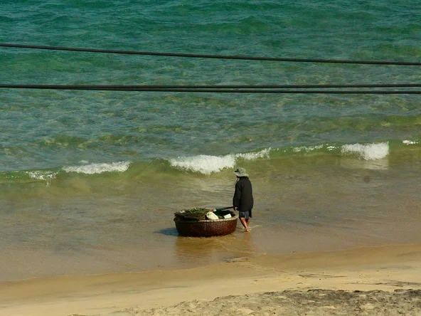 Local Vietnamese man on the beach in Quy Nhon