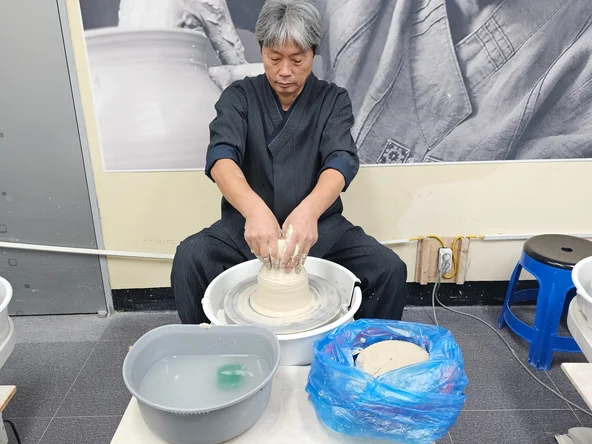 Potter at a pottery wheel