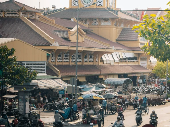 Saigon Central Post Office, with the road in front filled with motorbikes