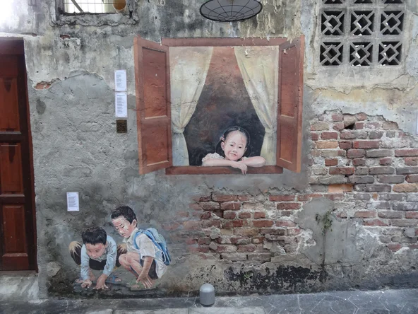 graffiti drawing of children in a window