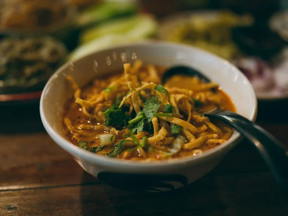 A close up of a bowl of Khao Soi noodle dish