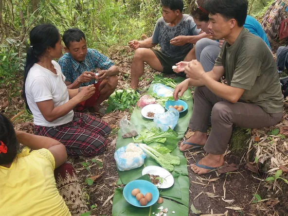 Preparing food, Hiking in Laos: Nam Et-Phou Louey National Protected Area