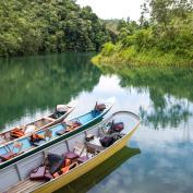 Longboats on lake at Batang Ai