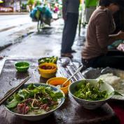 Eating Pho on the streets of Hanoi 