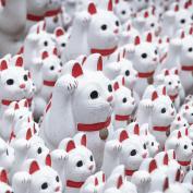 Waving lucky cat figures