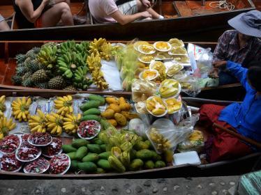 Fruit being sold on floating market in Bangkok