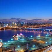 Calm waters under Yeongdong Bridge near Gangnam at night in Seoul, South Korea