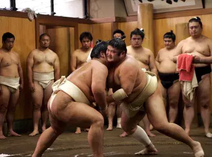 Traditional sumo wrestling training in a sumo stable for a tournament in Tokyo