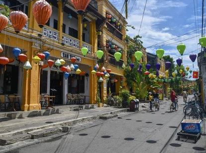 Sunshine over lantern strung streets in Hoi An June
