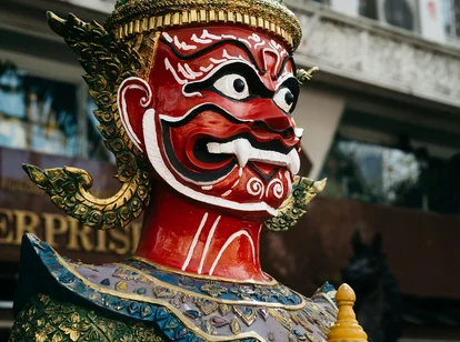 Thailand ghost festival face painted statue
