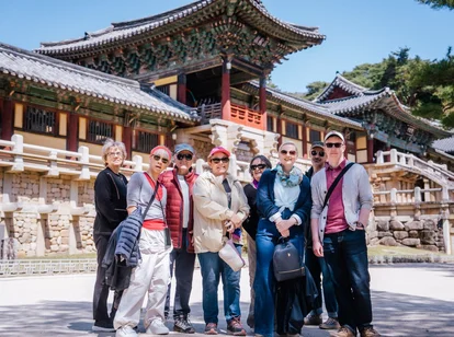 A group standing in front of Bulguksa Temple