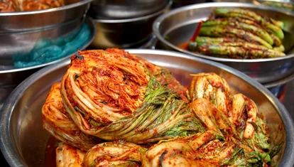 Spicy Korean cabbage in a stainless steel bowl