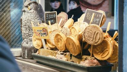 Edible lollipops in style of Korean coins at a street market