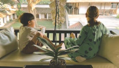 Children in elephant sanctuary glamping Thailand