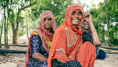 Indian women smiling at the camera