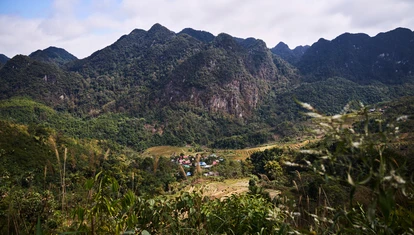 Vietnamese village nestled between hills