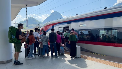 People queuing orderly for a train
