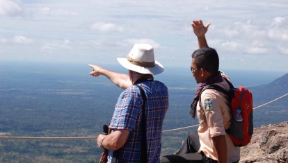 Andy with our lovely guide Bunthan – the fount of all knowledge and a firm friend by the end of our week with him.