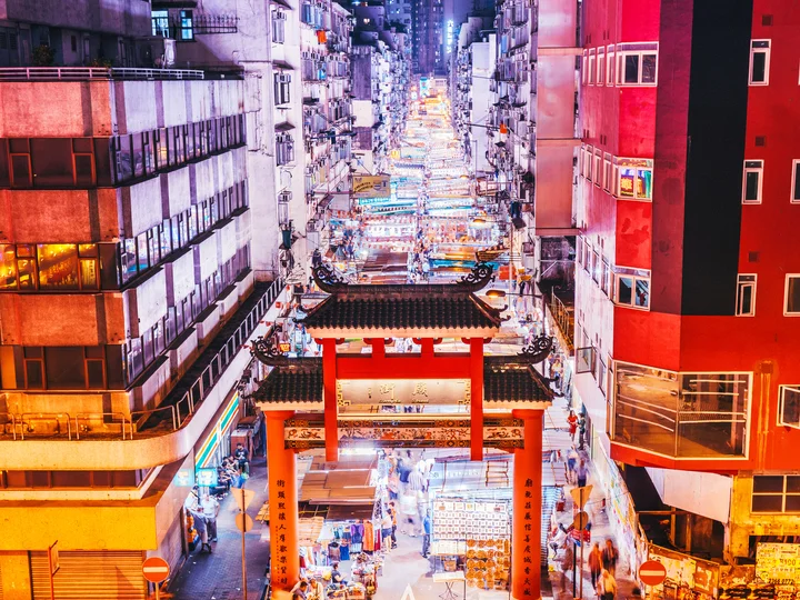 Aerial view of night market in middle of street in Hong Kong 