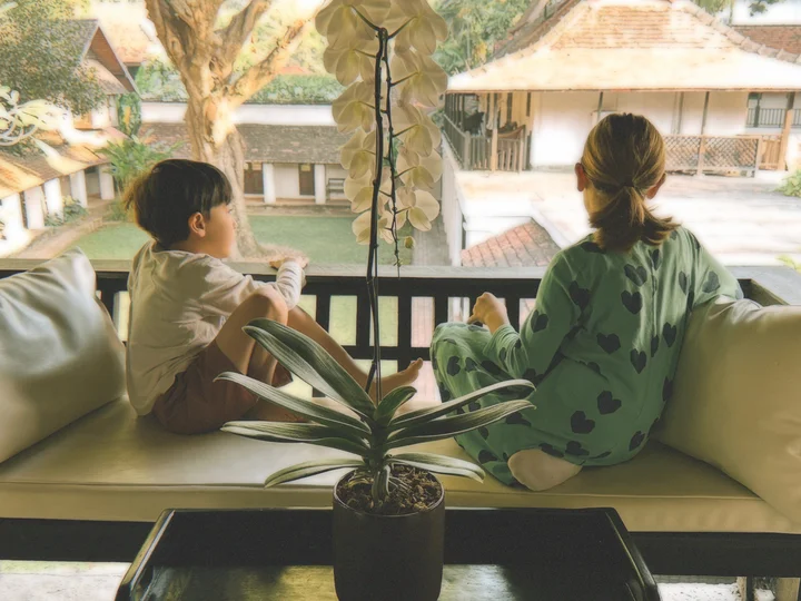 Children in elephant sanctuary glamping Thailand