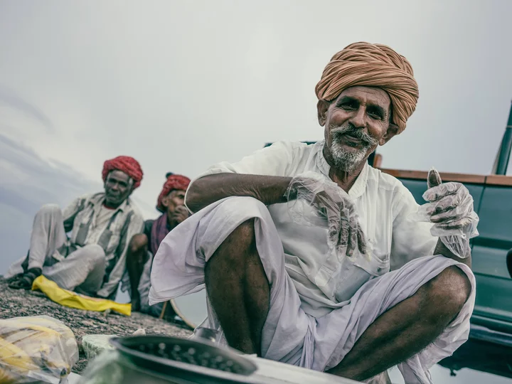 Indian man smiling at camera