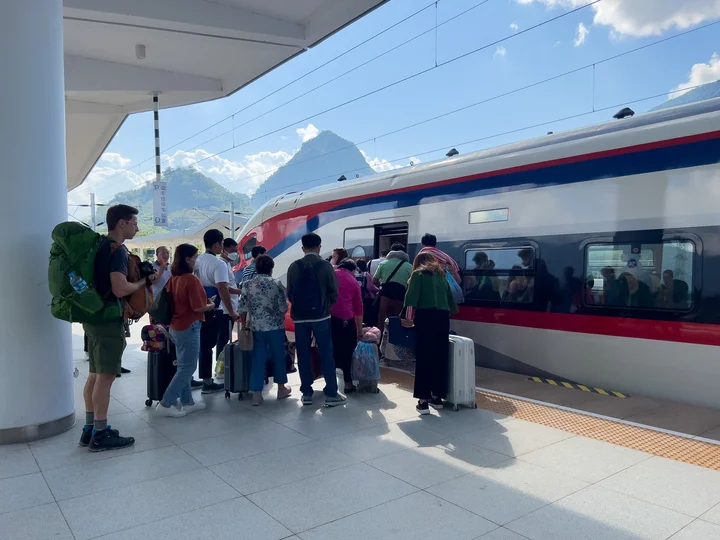 People queuing orderly for a train