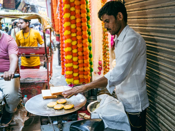 Man making street food in India